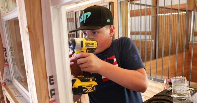 Students are building a mobile kitchen trailer for a Bend homeless village